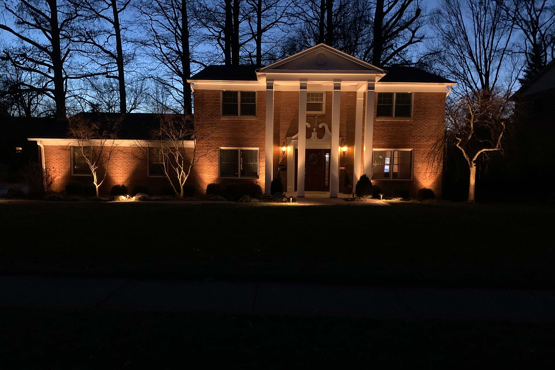 house-with-outdoor-lighting-with-trees-fort-wright-ky